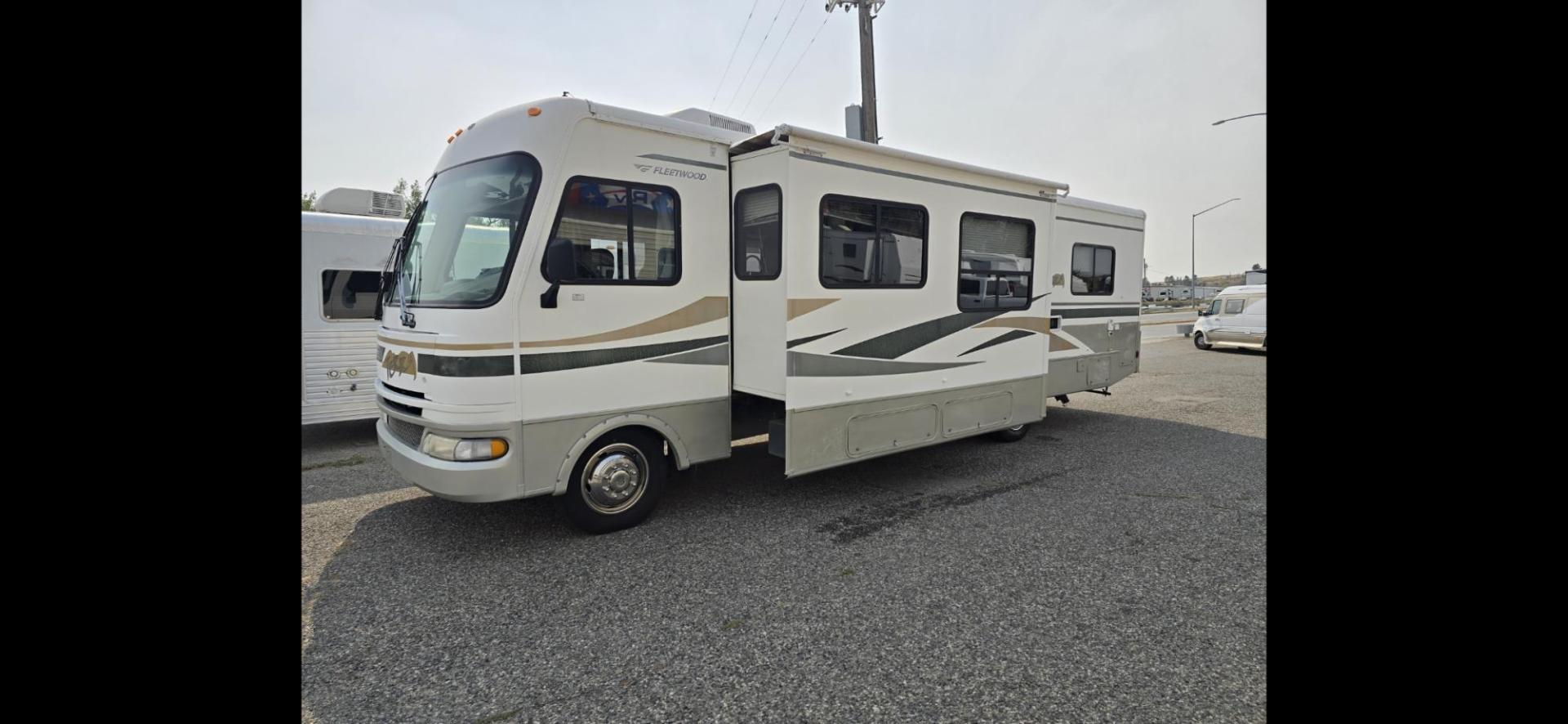 2005 White Fleetwood Terra , located at 923 US HWY 87 E., Billings, MT, 59101, (406) 245-0456, 45.795788, -108.451881 - 2005 Fleetwood Terra class A Motorhome with a Ford Triton V10 gas 32' with 1 slide. 74,018 miles, Couch and booth dinette both make into beds, Rear queen walk around bed, Could sleep 6, Onan 5500 generator, Leveling jacks, Dual A/C, Tires at 95%, Hot water, Furnace. WE CERTIFY OUR USED INVENTORY!!!! - Photo#0