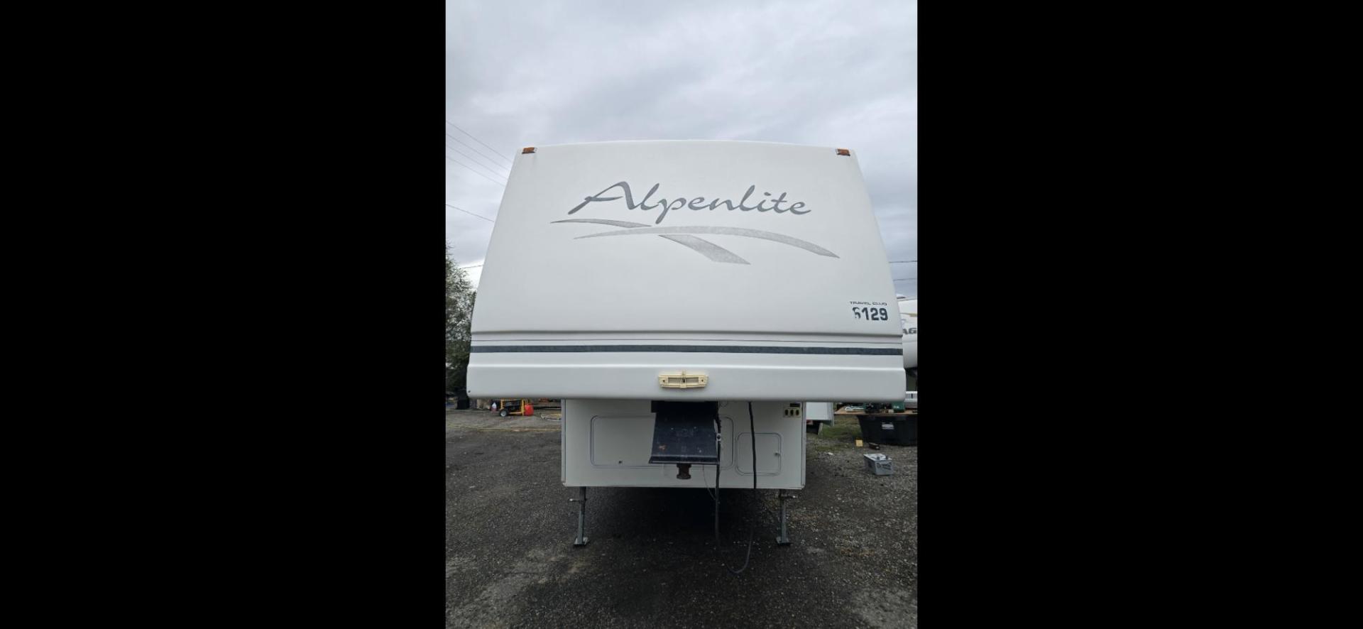 2002 White Alpenlite Spyglass , located at 923 US HWY 87 E., Billings, MT, 59101, (406) 245-0456, 45.795788, -108.451881 - Absolutely. Immaculate, little 29' fifth wheel with front queen walk around bed, rear living room, heated and enclosed underbelly, full four season, fireplace, central vac, 19"awning with metal guard, auto front jacks. Model Spyglass 29RL. Dry weight 9446lbs. John at 406 208 0659 - Photo#0