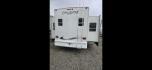2006 White Keystone Challenger 34SAQ , located at 923 US HWY 87 E., Billings, MT, 59101, (406) 245-0456, 45.795788, -108.451881 - 2006 Keystone Challenger This is a gorgeous trailer. Located in Billings MT. 4 season Four slides, rear living room, front queen walk around bed, front designer closet, couch makes into a bed, could sleep four, washer and dryer hookups, a/c , hot water, furnace. WE CERTIFY OUR USED TRAILERS. Jo - Photo#4