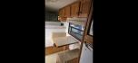 2003 White Exiss XT408 , located at 923 US HWY 87 E., Billings, MT, 59101, (406) 245-0456, 45.795788, -108.451881 - 2003 Exiss XT408 4 Horse LQ Located in Billings MT $27,900 4 horse slant with 10' living quarters, 7' wide, front queen bed, booth dinette makes into a bed, aluminum on aluminum, fridge, hot water, a/c, manual jack, fold down windows on the front, tires at 90%, bearings packed and ready to rode - Photo#4