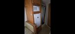 2003 White Exiss XT408 , located at 923 US HWY 87 E., Billings, MT, 59101, (406) 245-0456, 45.795788, -108.451881 - 2003 Exiss XT408 4 Horse LQ Located in Billings MT $27,900 4 horse slant with 10' living quarters, 7' wide, front queen bed, booth dinette makes into a bed, aluminum on aluminum, fridge, hot water, a/c, manual jack, fold down windows on the front, tires at 90%, bearings packed and ready to rode - Photo#8