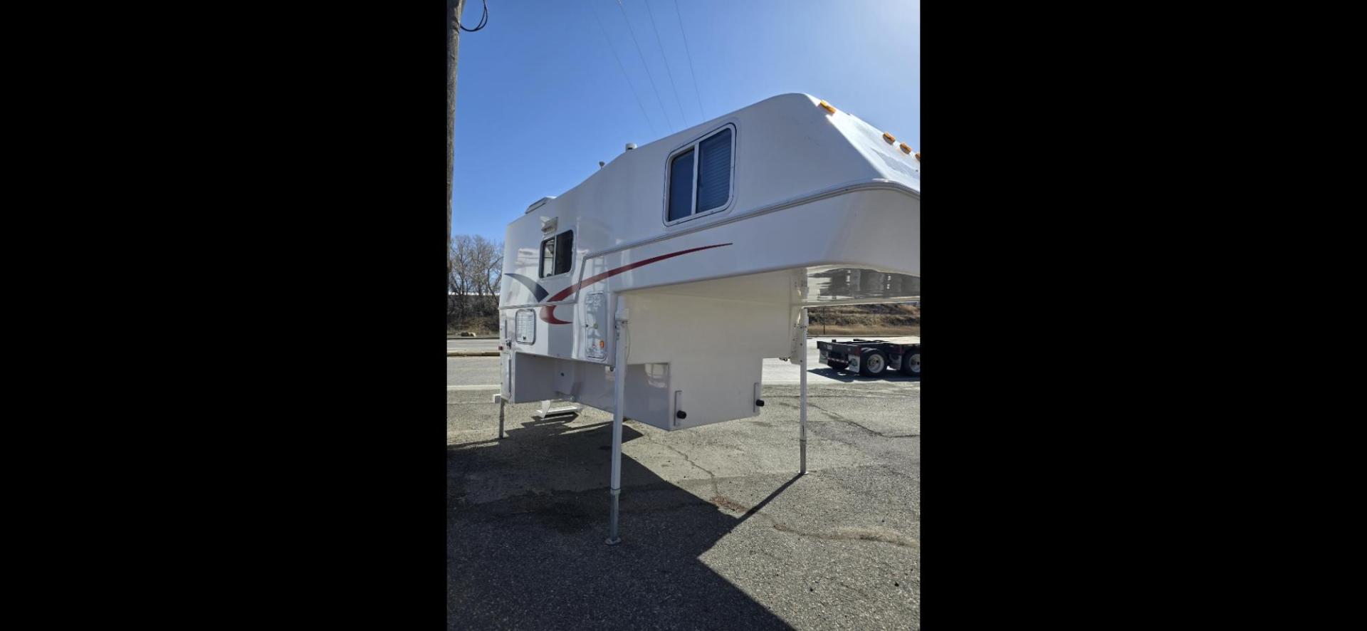 2020 White Northern Lite Sportsman , located at 923 US HWY 87 E., Billings, MT, 59101, (406) 245-0456, 45.795788, -108.451881 - 2020 Northern Lite Sportsman 8-11 Like brand new!!!! 2020 Northern Lite Sportsman slide in. 7'1" long floor, model.8-11, for a short box, 2 piece fiberglass., lightweight, wet bath, full bath shower toilet,front queen bed, dinette makes into bed, could sleep 4, microwave, auto jacks, four season - Photo#4
