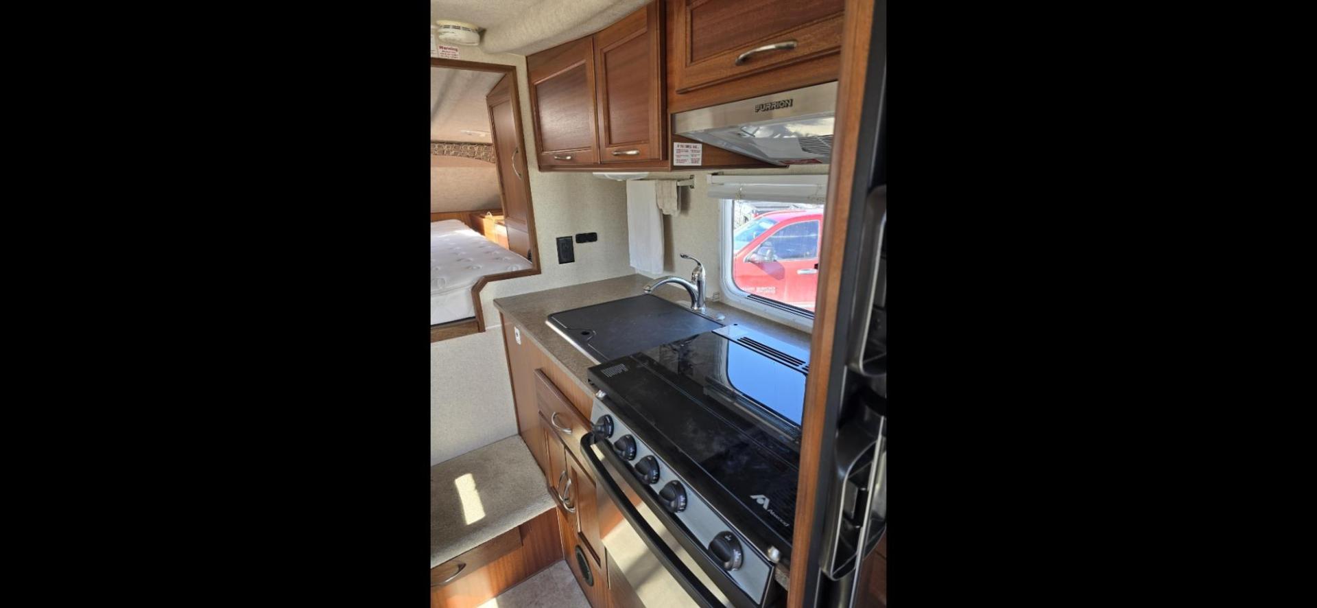 2020 White Northern Lite Sportsman , located at 923 US HWY 87 E., Billings, MT, 59101, (406) 245-0456, 45.795788, -108.451881 - 2020 Northern Lite Sportsman 8-11 Like brand new!!!! 2020 Northern Lite Sportsman slide in. 7'1" long floor, model.8-11, for a short box, 2 piece fiberglass., lightweight, wet bath, full bath shower toilet,front queen bed, dinette makes into bed, could sleep 4, microwave, auto jacks, four season - Photo#8
