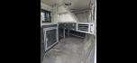 2001 White Sidekick 4 Horse LQ , located at 923 US HWY 87 E., Billings, MT, 59101, (406) 245-0456, 45.795788, -108.451881 - Absolutely gorgeous 2001 Sidekick!! Located in Billings MT 4 horse, 8' wide with 11' shortwall. Overall length is 43.5'. Aluminum on aluminum, mangers, onan 4000 watt generator with remote start, auto awning, triple oil bath axles, satellite dish, furnace, hot water. Bathroom is 8' long. Short - Photo#3