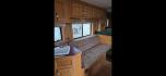 2001 White Sidekick 4 Horse LQ , located at 923 US HWY 87 E., Billings, MT, 59101, (406) 245-0456, 45.795788, -108.451881 - Absolutely gorgeous 2001 Sidekick!! Located in Billings MT 4 horse, 8' wide with 11' shortwall. Overall length is 43.5'. Aluminum on aluminum, mangers, onan 4000 watt generator with remote start, auto awning, triple oil bath axles, satellite dish, furnace, hot water. Bathroom is 8' long. Short - Photo#9