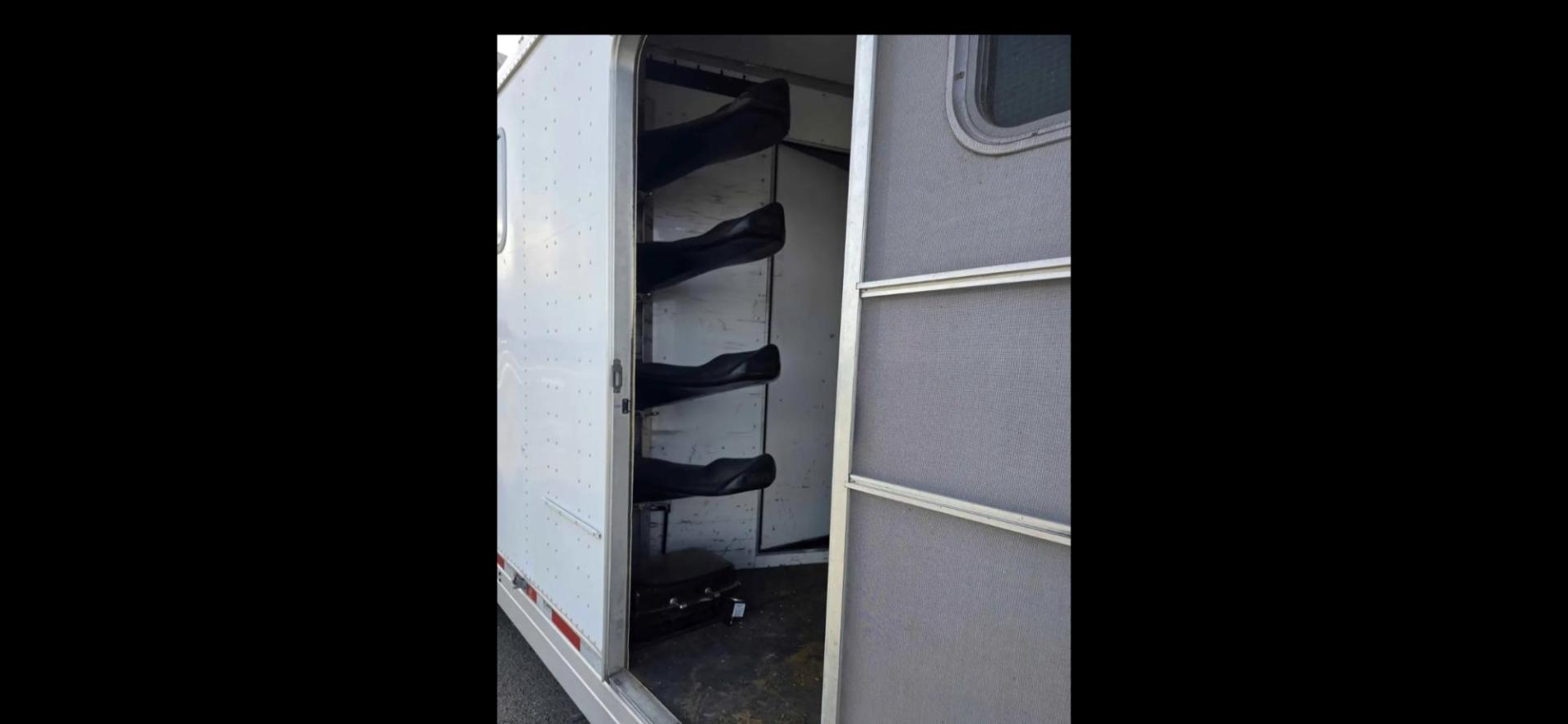 2003 White Feather Lite 4 Horse , located at 923 US HWY 87 E., Billings, MT, 59101, (406) 245-0456, 45.795788, -108.451881 - 2003 Feather Lite 4Horse LQ Located in Billings $33,900 2003 FeatherLite 4 horse 8 wide... huge mid tack... Slide... Onan 7k Generator w auto remote start... hay rack... 14ply 2020 tires 90%... dual auto front jacks... aluminum on aluminum.... no mangers w collapsible rear tack... rear ramp - Photo#13