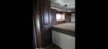 2003 White Feather Lite 4 Horse , located at 923 US HWY 87 E., Billings, MT, 59101, (406) 245-0456, 45.795788, -108.451881 - 2003 Feather Lite 4Horse LQ Located in Billings $33,900 2003 FeatherLite 4 horse 8 wide... huge mid tack... Slide... Onan 7k Generator w auto remote start... hay rack... 14ply 2020 tires 90%... dual auto front jacks... aluminum on aluminum.... no mangers w collapsible rear tack... rear ramp - Photo#7