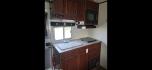 2003 White Feather Lite 4 Horse , located at 923 US HWY 87 E., Billings, MT, 59101, (406) 245-0456, 45.795788, -108.451881 - 2003 Feather Lite 4Horse LQ Located in Billings $33,900 2003 FeatherLite 4 horse 8 wide... huge mid tack... Slide... Onan 7k Generator w auto remote start... hay rack... 14ply 2020 tires 90%... dual auto front jacks... aluminum on aluminum.... no mangers w collapsible rear tack... rear ramp - Photo#9