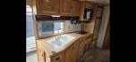 2003 White Feather Lite 3 Horse , located at 923 US HWY 87 E., Billings, MT, 59101, (406) 245-0456, 45.795788, -108.451881 - 2003 FeatherLite 3 Horse LQ w/slide Located in Billings MT. $41,900 DON'T MISS OUT ON THIS!!!! 16'8"LQ, 7'6" interior height, slants 36" wide, short side of tack 11', long side 13', 8' wide. Onan 7000 gen with only 1316 hours, mangers, leveling Jack front and rear, aluminum on aluminum rear r - Photo#15