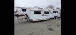 2003 White Feather Lite 3 Horse , located at 923 US HWY 87 E., Billings, MT, 59101, (406) 245-0456, 45.795788, -108.451881 - 2003 FeatherLite 3 Horse LQ w/slide Located in Billings MT. $41,900 DON'T MISS OUT ON THIS!!!! 16'8"LQ, 7'6" interior height, slants 36" wide, short side of tack 11', long side 13', 8' wide. Onan 7000 gen with only 1316 hours, mangers, leveling Jack front and rear, aluminum on aluminum rear r - Photo#2