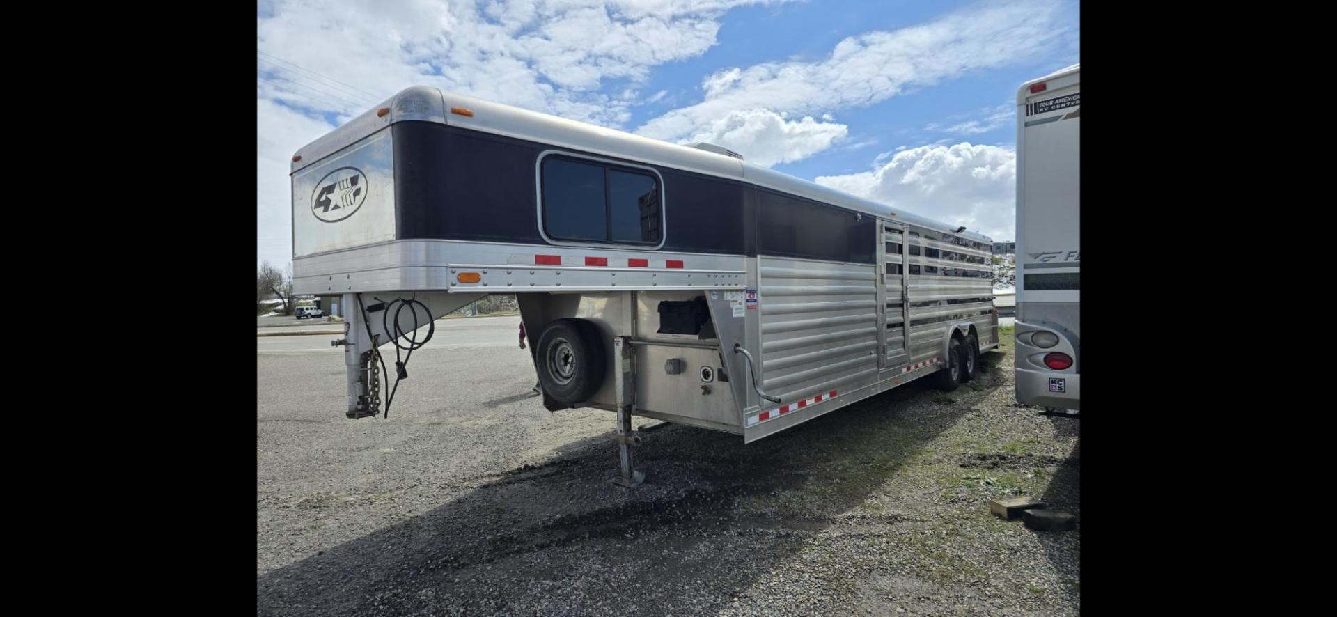 2011 Black 4 Star Stock , located at 923 US HWY 87 E., Billings, MT, 59101, (406) 245-0456, 45.795788, -108.451881 - 2011 Four Star stock trailer Located in Billings MT $35,900 Overall length 36'8", floor 28'8", short wall 6' 8", 6' 7" interior height in stock area. 8' wide. Rear stock with full l q, bath shower toilet, A/C, heat hot water. Aluminum on aluminum. Front queen bed. WE CERTIFY OUR USED TRAILERS! - Photo#1