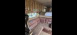 2014 Elite 5 Horse LQ , located at 923 US HWY 87 E., Billings, MT, 59101, (406) 245-0456, 45.795788, -108.451881 - 2014 Elite 5 Horse LQ Billings MT $85,900 This is such a nice trailer!!! OUTLAW conversion package. 5 horse with a 16' short wall. Generator, hay pod, satellite dish, rear tack, aluminum on aluminum, fold down windows front and back, studwall, auto awning. 8' wide, 41' overall, floor length 3 - Photo#9