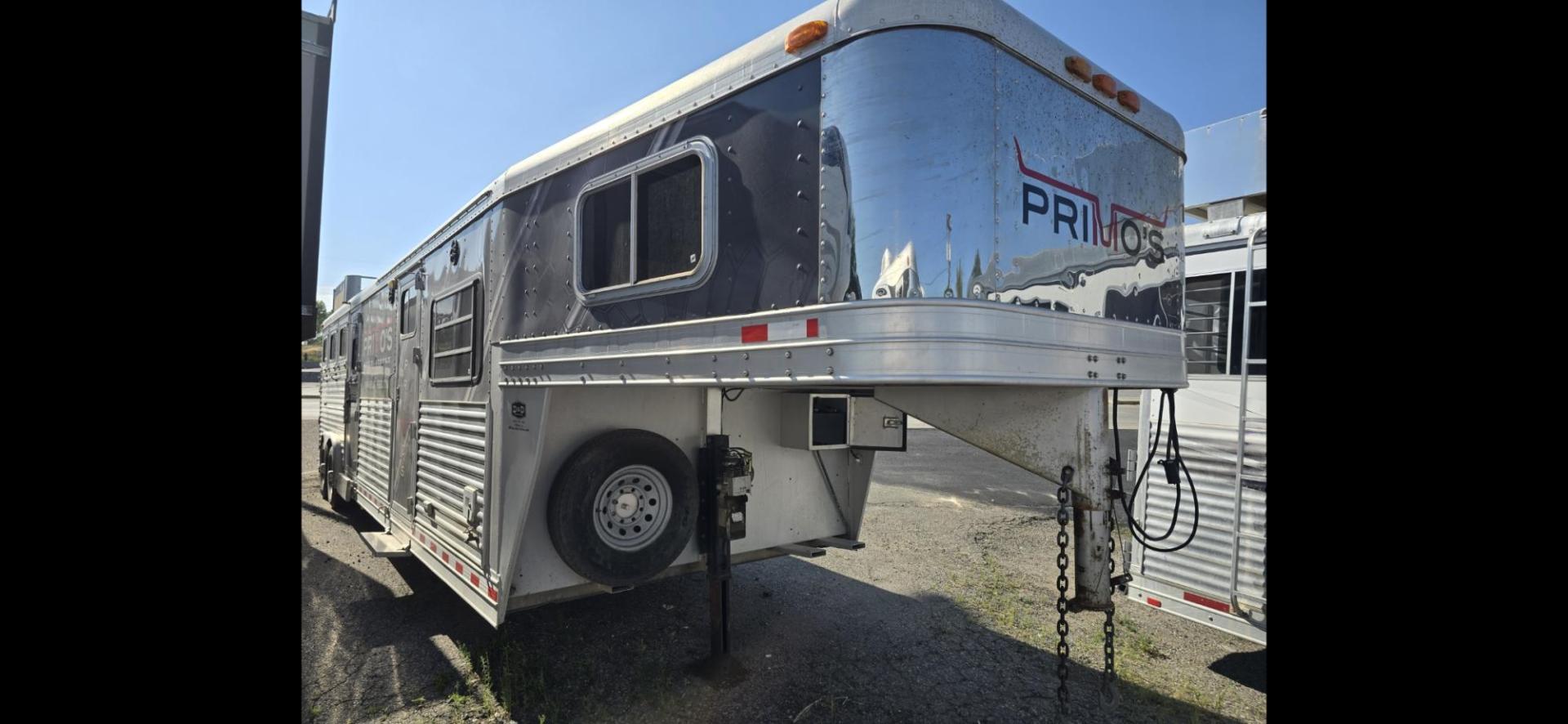 2004 Silver Elite 4 Horse LQ , located at 923 US HWY 87 E., Billings, MT, 59101, (406) 245-0456, 45.795788, -108.451881 - 2004 Elite 4 Horse LQ 2004 Elite 4 Horse w/LQ Located in Billings MT $35,900 This is a really nice trailer!! 4 Horse with 12' living quarters. Aluminum on aluminum, 4 Spot saddle rack, onan 5500 generator, hay rack, stud wall, Mangers w/ storage underneath, full bath shower toilet, a/c hot w - Photo#0