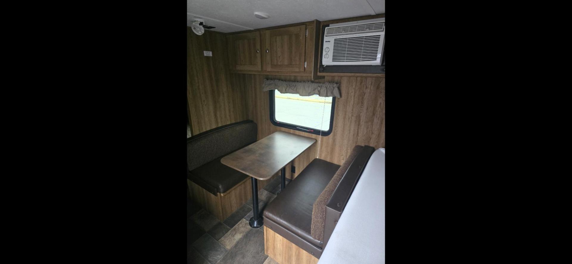 2017 Grey Keystone Springdale Fireside , located at 923 US HWY 87 E., Billings, MT, 59101, (406) 245-0456, 45.795788, -108.451881 - 2017 Keystone Sprinter READY TO HUNT 20017 Springdale 1800BH travel trailer. Half ton towable.Dry weight 3195 lbs. Front queen bed, rear double bunks, dinette makes into a bed. Could sleep six. Full bath, shower toilet, outside stereo, a/c, hot water, furnace. Light hail. WE CERTIFY OUR USED TR - Photo#5