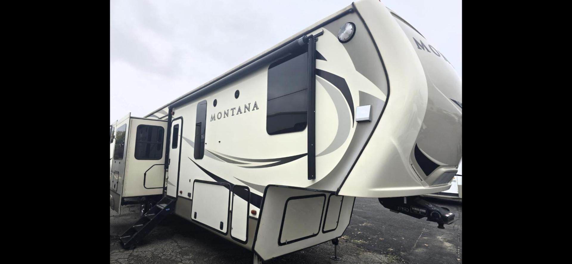 2018 Tan Keystone Montana , located at 923 US HWY 87 E., Billings, MT, 59101, (406) 245-0456, 45.795788, -108.451881 - 2018 Keystone Montana HOME AWAY FROM HOME-- Like New!!! 2018 Montana 3791RD with five slides, 4 season,1 owner, 40' long. Two ducted a/c's, auto leveling, 10 gallon gas dsi water heater, rear den, front king bed, front designer closet, washer dryer combo, fireplace, double door fridge and freezer, - Photo#1
