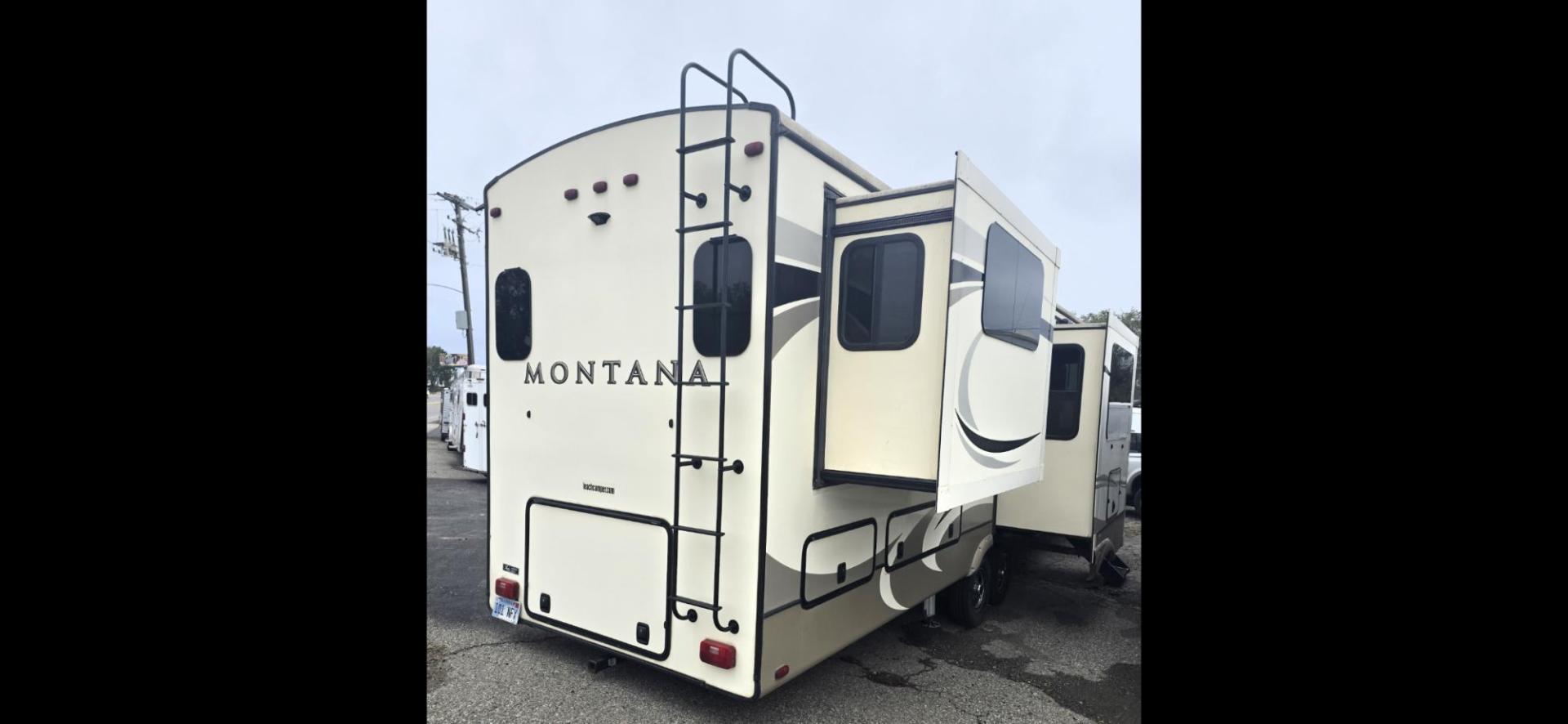 2018 Tan Keystone Montana , located at 923 US HWY 87 E., Billings, MT, 59101, (406) 245-0456, 45.795788, -108.451881 - 2018 Keystone Montana HOME AWAY FROM HOME-- Like New!!! 2018 Montana 3791RD with five slides, 4 season,1 owner, 40' long. Two ducted a/c's, auto leveling, 10 gallon gas dsi water heater, rear den, front king bed, front designer closet, washer dryer combo, fireplace, double door fridge and freezer, - Photo#2