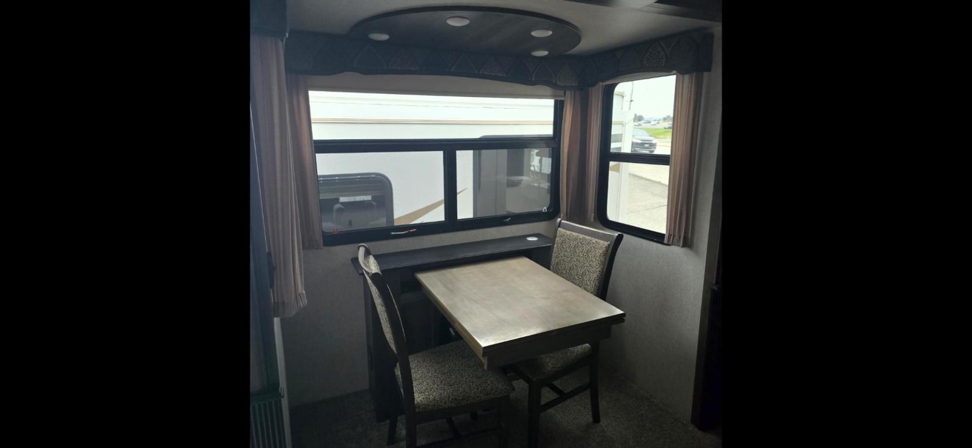 2018 Tan Keystone Montana , located at 923 US HWY 87 E., Billings, MT, 59101, (406) 245-0456, 45.795788, -108.451881 - 2018 Keystone Montana HOME AWAY FROM HOME-- Like New!!! 2018 Montana 3791RD with five slides, 4 season,1 owner, 40' long. Two ducted a/c's, auto leveling, 10 gallon gas dsi water heater, rear den, front king bed, front designer closet, washer dryer combo, fireplace, double door fridge and freezer, - Photo#7