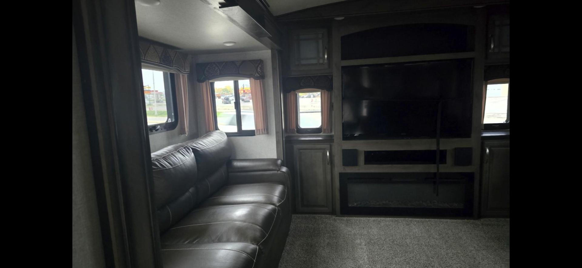 2018 Tan Keystone Montana , located at 923 US HWY 87 E., Billings, MT, 59101, (406) 245-0456, 45.795788, -108.451881 - 2018 Keystone Montana HOME AWAY FROM HOME-- Like New!!! 2018 Montana 3791RD with five slides, 4 season,1 owner, 40' long. Two ducted a/c's, auto leveling, 10 gallon gas dsi water heater, rear den, front king bed, front designer closet, washer dryer combo, fireplace, double door fridge and freezer, - Photo#8