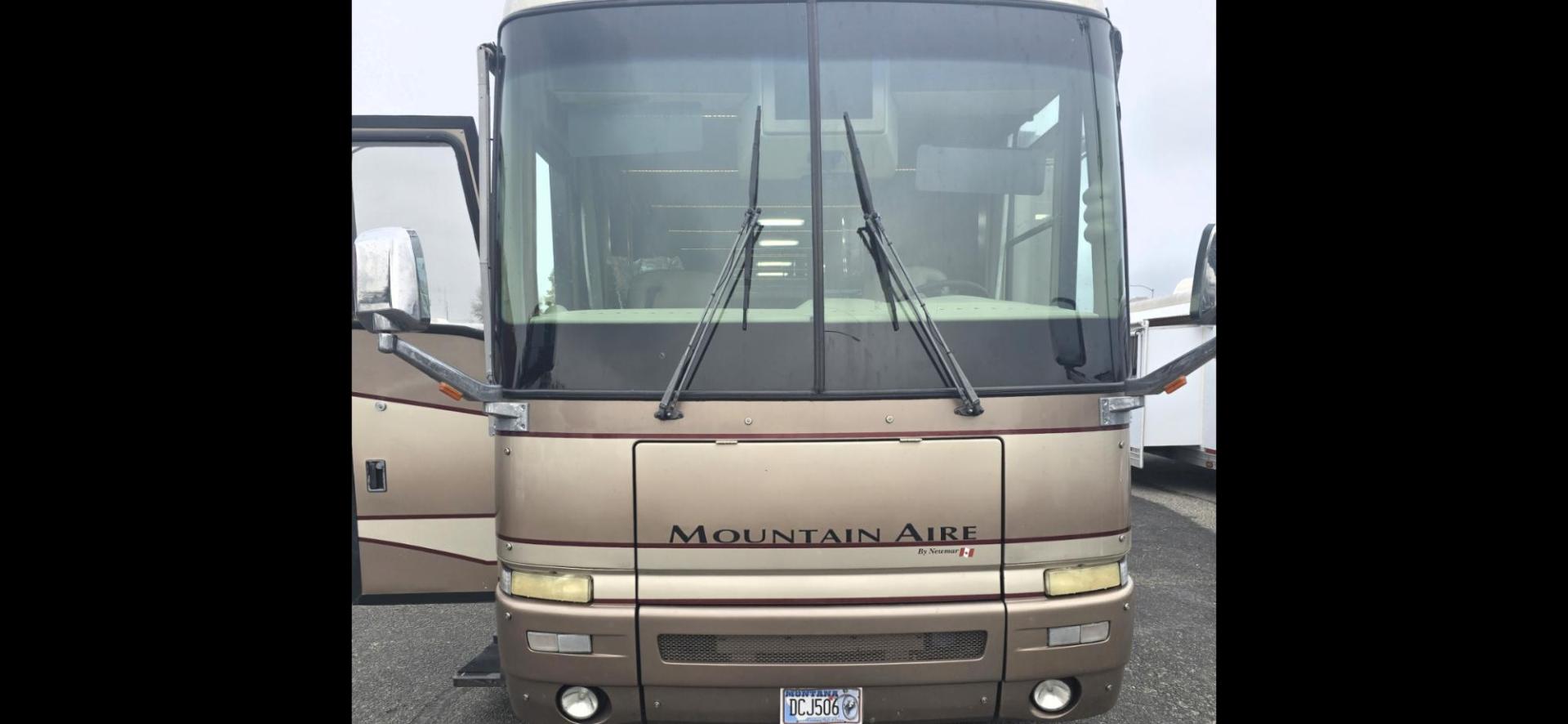 2002 Tan Newmar Mountain Aire , located at 923 US HWY 87 E., Billings, MT, 59101, (406) 245-0456, 45.795788, -108.451881 - 2002 Newmar Mountain Air Immaculate 42' Class A diesel pusher with only 77,000 miles, 42', and 2 owners. 500 Cummins w/6 speed Allison tranny. 3 slides, full body paint, full 4 season. Auto awning, tile floor, 2 new ac's, aqua hot, new dash a/c pump, new tires w/only 4000 miles on them, Full body - Photo#1