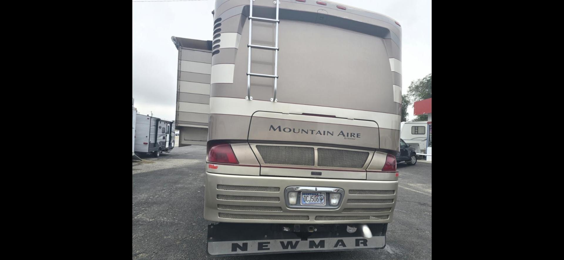 2002 Tan Newmar Mountain Aire , located at 923 US HWY 87 E., Billings, MT, 59101, (406) 245-0456, 45.795788, -108.451881 - 2002 Newmar Mountain Air Immaculate 42' Class A diesel pusher with only 77,000 miles, 42', and 2 owners. 500 Cummins w/6 speed Allison tranny. 3 slides, full body paint, full 4 season. Auto awning, tile floor, 2 new ac's, aqua hot, new dash a/c pump, new tires w/only 4000 miles on them, Full body - Photo#3