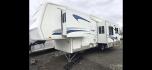 2004 White Keystone Challenger , located at 923 US HWY 87 E., Billings, MT, 59101, (406) 245-0456, 45.795788, -108.451881 - 2004 Keystone Challenger Very nice 29' 5th wheel with 2 slides. Front queen bed with huge front wardrobe closet. Couch makes into bed and could sleep 4.Full four season, a/c, hot water, furnace, oak cabinets, full awning.. Model 29RLB. WE CERTIFY OUR USED TRAILERS. John at 406 208 0659. - Photo#1