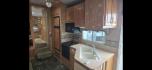 2004 White Keystone Challenger , located at 923 US HWY 87 E., Billings, MT, 59101, (406) 245-0456, 45.795788, -108.451881 - 2004 Keystone Challenger Very nice 29' 5th wheel with 2 slides. Front queen bed with huge front wardrobe closet. Couch makes into bed and could sleep 4.Full four season, a/c, hot water, furnace, oak cabinets, full awning.. Model 29RLB. WE CERTIFY OUR USED TRAILERS. John at 406 208 0659. - Photo#4