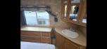 2004 White Keystone Challenger , located at 923 US HWY 87 E., Billings, MT, 59101, (406) 245-0456, 45.795788, -108.451881 - 2004 Keystone Challenger Very nice 29' 5th wheel with 2 slides. Front queen bed with huge front wardrobe closet. Couch makes into bed and could sleep 4.Full four season, a/c, hot water, furnace, oak cabinets, full awning.. Model 29RLB. WE CERTIFY OUR USED TRAILERS. John at 406 208 0659. - Photo#7