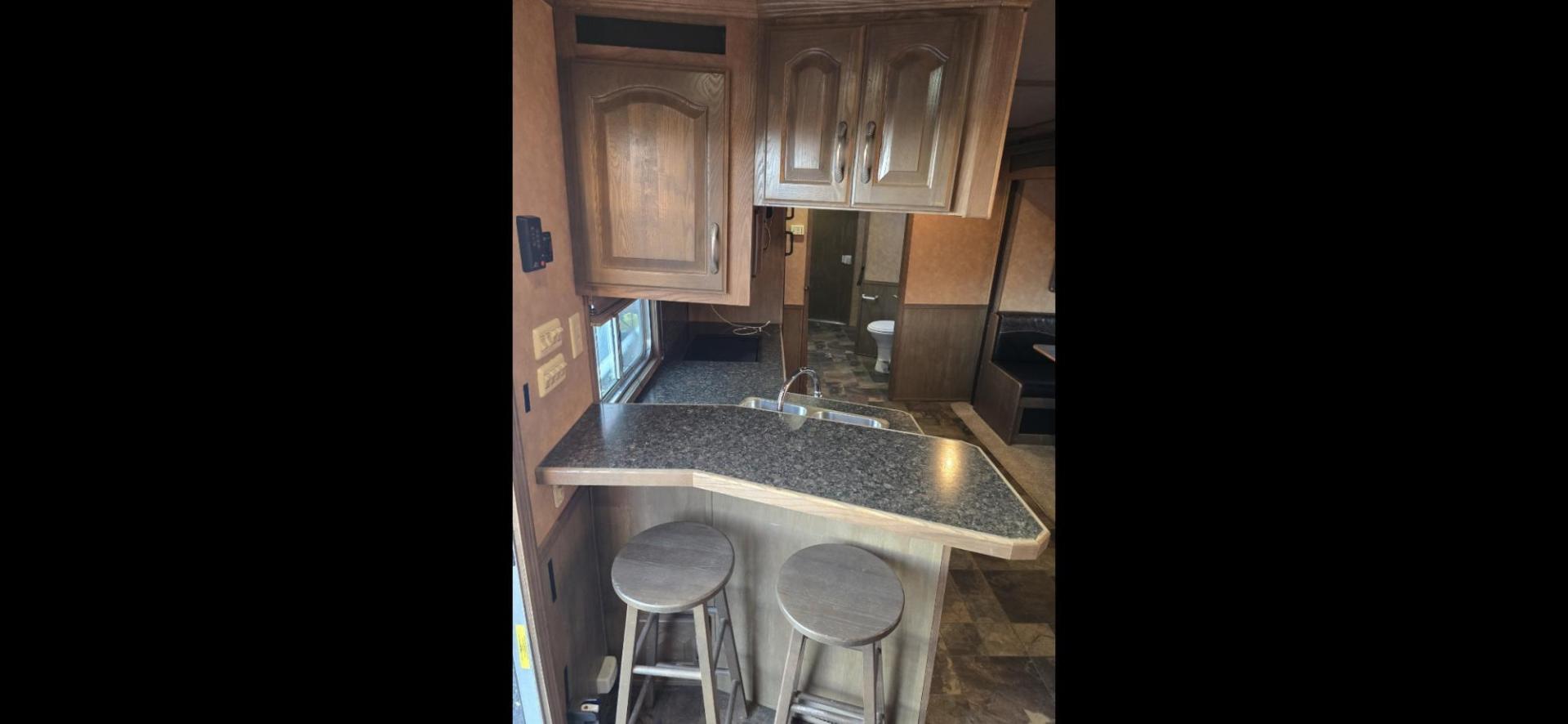 2011 White Lakota Big Horn , located at 923 US HWY 87 E., Billings, MT, 59101, (406) 245-0456, 45.795788, -108.451881 - 2011 Lakota Big Horn 8416 2011 Lakota Big Horn 4 Horse slant with super slide Located in Billings MT $55,900 This is such a nice trailer!!! 42' overall, empty weight 11,475 lbs, 8' wide, 16' LQ. Super slide, front Queen bed, Jackknife couch and booth dinette both make into beds. Could - Photo#14