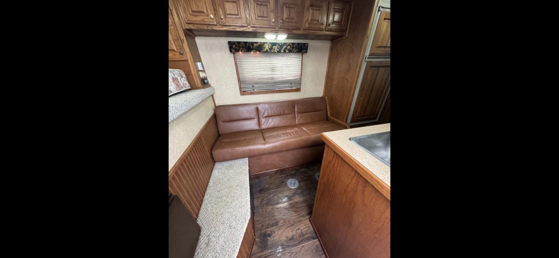 2003 Kiefer Gensis , located at 923 US HWY 87 E., Billings, MT, 59101, (406) 245-0456, 45.795788, -108.451881 - 2003 Kiefer Genesis S3120 2003 Kiefer Gensis S3120 LQ Located in Billings MT 50101 $21,900 This is a really nice 3 horse slant trailer with 14' LQ, 29' overall and 7' wide Queen size front bed, couch jack knife into bed, rear double bunks. Full bathroom with shower, toilet, and sink.A/C, hot - Photo#6