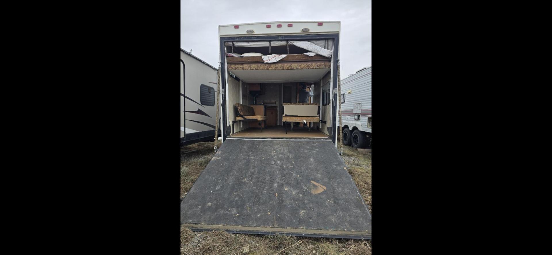 2007 White Thor Vortex , located at 923 US HWY 87 E., Billings, MT, 59101, (406) 245-0456, 45.795788, -108.451881 - Nice 2007 Thor Vortex 1/2 ton towable toy hauler with 15 gallon fuel station. Garage is 15' long. 9' is 8' wide and 6' is 6'4" wide. Lots of sleeping space. Double auto queen beds in ceiling, booth and couch both fold into beds. A/C, forced air heat, hot water, dual thirty pound propane tanks. Mode - Photo#3