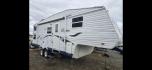 2006 White Pilgrim 5th wheel , located at 923 US HWY 87 E., Billings, MT, 59101, (406) 245-0456, 45.795788, -108.451881 - This is a very nice 1/2 ton towable 27' fifth wheel with a full super slide. Front queen walk around bed and rear double bunks. Couch and booth dynette both make into beds, could sleep 8. flipped axles for clearance, a/c, forced air heat, hot water, inside/outside showers, full bath shower toilet a - Photo#0