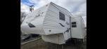 2006 White Pilgrim 5th wheel , located at 923 US HWY 87 E., Billings, MT, 59101, (406) 245-0456, 45.795788, -108.451881 - This is a very nice 1/2 ton towable 27' fifth wheel with a full super slide. Front queen walk around bed and rear double bunks. Couch and booth dynette both make into beds, could sleep 8. flipped axles for clearance, a/c, forced air heat, hot water, inside/outside showers, full bath shower toilet a - Photo#1