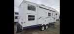 2006 White Pilgrim 5th wheel , located at 923 US HWY 87 E., Billings, MT, 59101, (406) 245-0456, 45.795788, -108.451881 - This is a very nice 1/2 ton towable 27' fifth wheel with a full super slide. Front queen walk around bed and rear double bunks. Couch and booth dynette both make into beds, could sleep 8. flipped axles for clearance, a/c, forced air heat, hot water, inside/outside showers, full bath shower toilet a - Photo#3