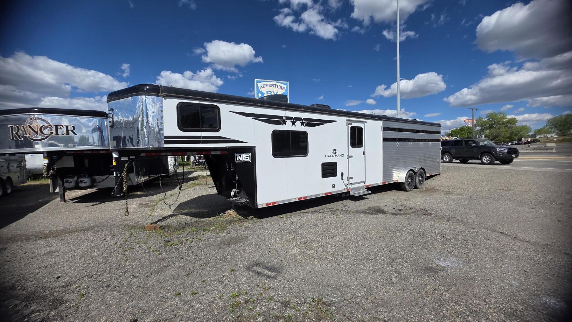 2024 White Bison Trailers Hand 711 , located at 923 US HWY 87 E., Billings, MT, 59101, (406) 245-0456, 45.795788, -108.451881 - 2024 Bison Trail Hand Located in Billings MT $44,900 2024 Bison Trail Hand 711 living quarters stock back. 13500 Ac.. forced air heat... full bath shower toilet... double door fridge... Aluminum on aluminum.. huge 4 horse mid tack... rear is 81inches wide... 16ft long... 7ft4in tall. Stock- Photo#0