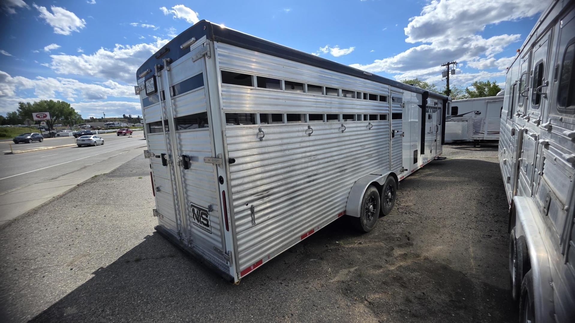 2024 White Bison Trailers Hand 711 , located at 923 US HWY 87 E., Billings, MT, 59101, (406) 245-0456, 45.795788, -108.451881 - 2024 Bison Trail Hand Located in Billings MT $44,900 2024 Bison Trail Hand 711 living quarters stock back. 13500 Ac.. forced air heat... full bath shower toilet... double door fridge... Aluminum on aluminum.. huge 4 horse mid tack... rear is 81inches wide... 16ft long... 7ft4in tall. Stock- Photo#1