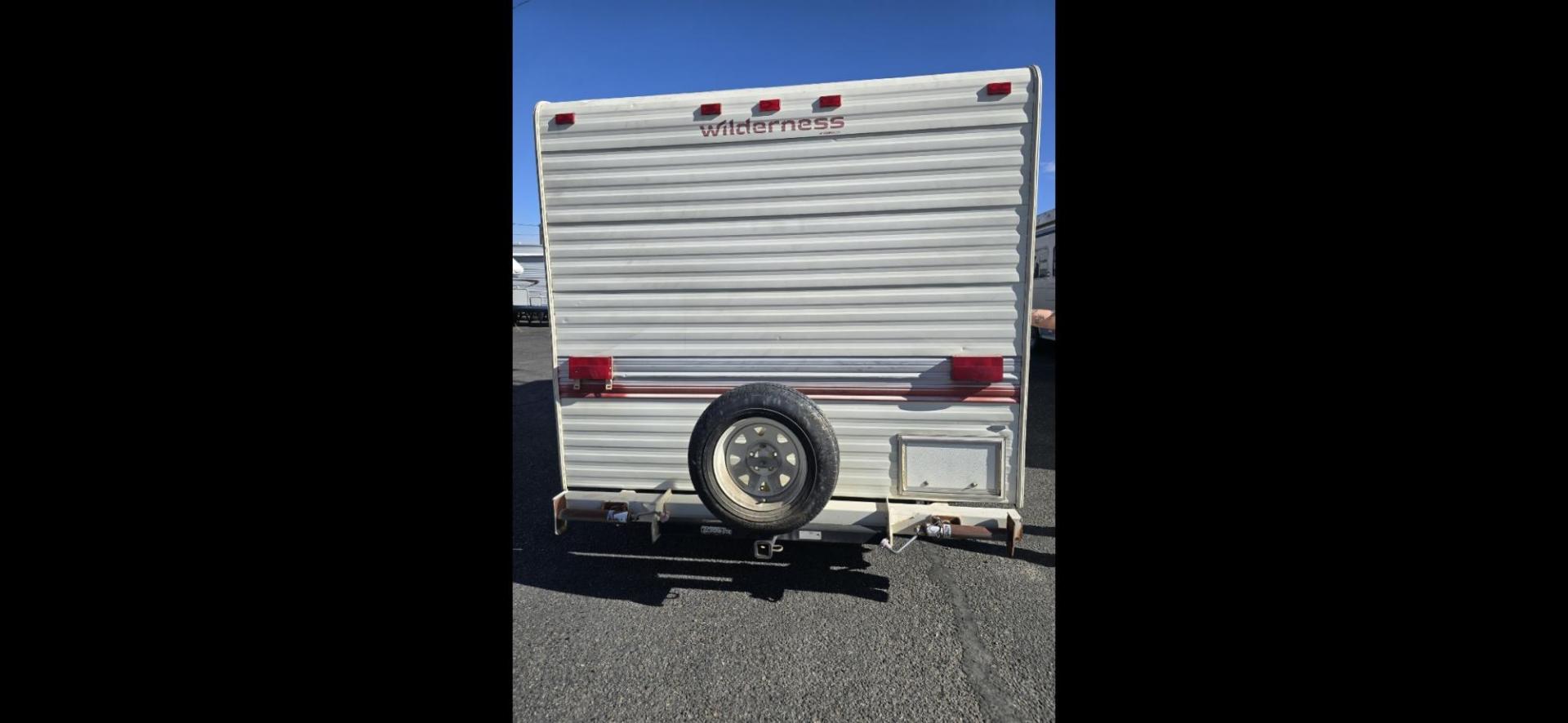 1993 White Fleetwood Wilderness , located at 923 US HWY 87 E., Billings, MT, 59101, (406) 245-0456, 45.795788, -108.451881 - 1993 Fleetwood Wilderness CAMPING ON A BUDGET!!! 19' travel trailer that is 1/2 ton towable. Booth dinette and Jack knife couch both make into beds. Full bath, shower toilet, AC, furnace. Nice sized refrigerator, front viewing window, 6 gal hot water heater. WE CERTIFY OUR USED TRAILERS!!! John - Photo#2