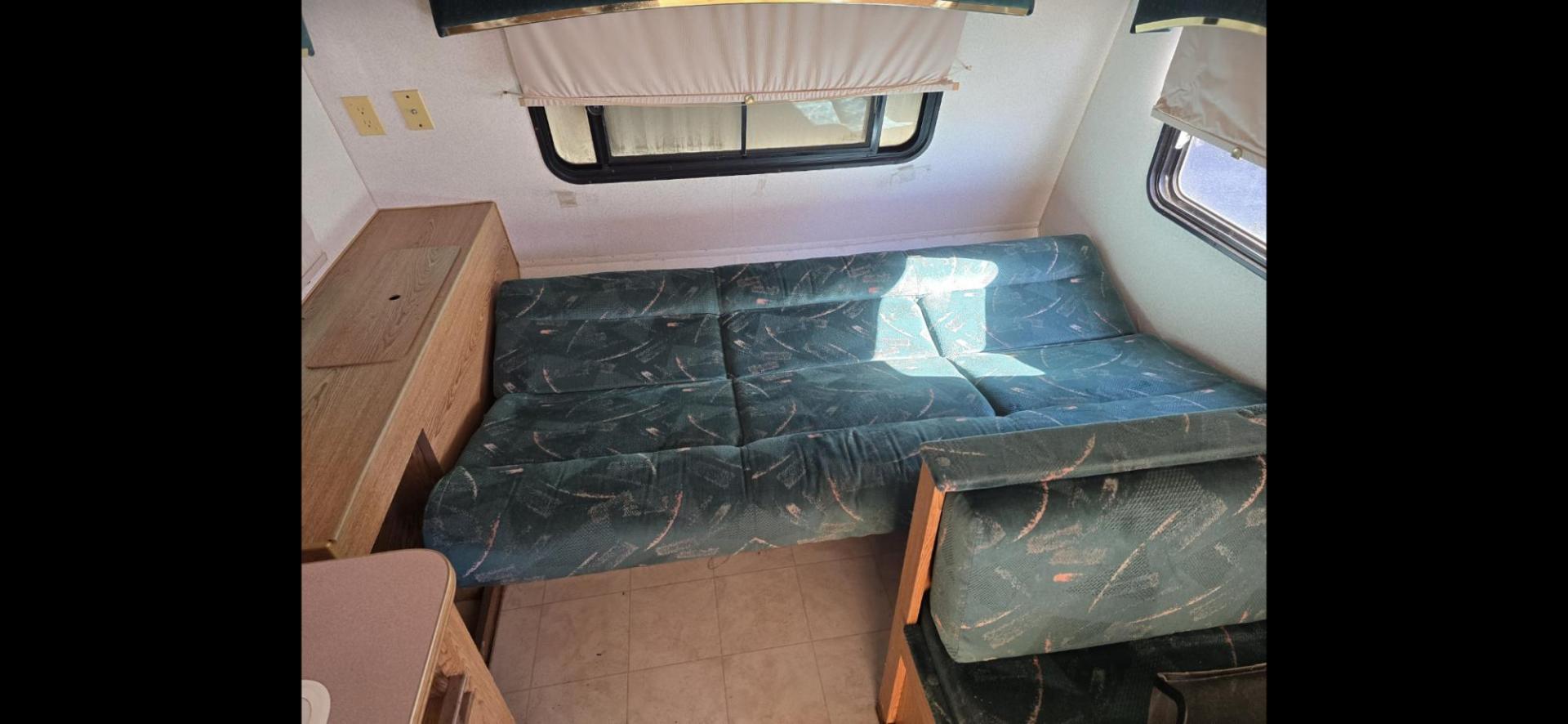 1993 White Fleetwood Wilderness , located at 923 US HWY 87 E., Billings, MT, 59101, (406) 245-0456, 45.795788, -108.451881 - 1993 Fleetwood Wilderness CAMPING ON A BUDGET!!! 19' travel trailer that is 1/2 ton towable. Booth dinette and Jack knife couch both make into beds. Full bath, shower toilet, AC, furnace. Nice sized refrigerator, front viewing window, 6 gal hot water heater. WE CERTIFY OUR USED TRAILERS!!! John - Photo#5