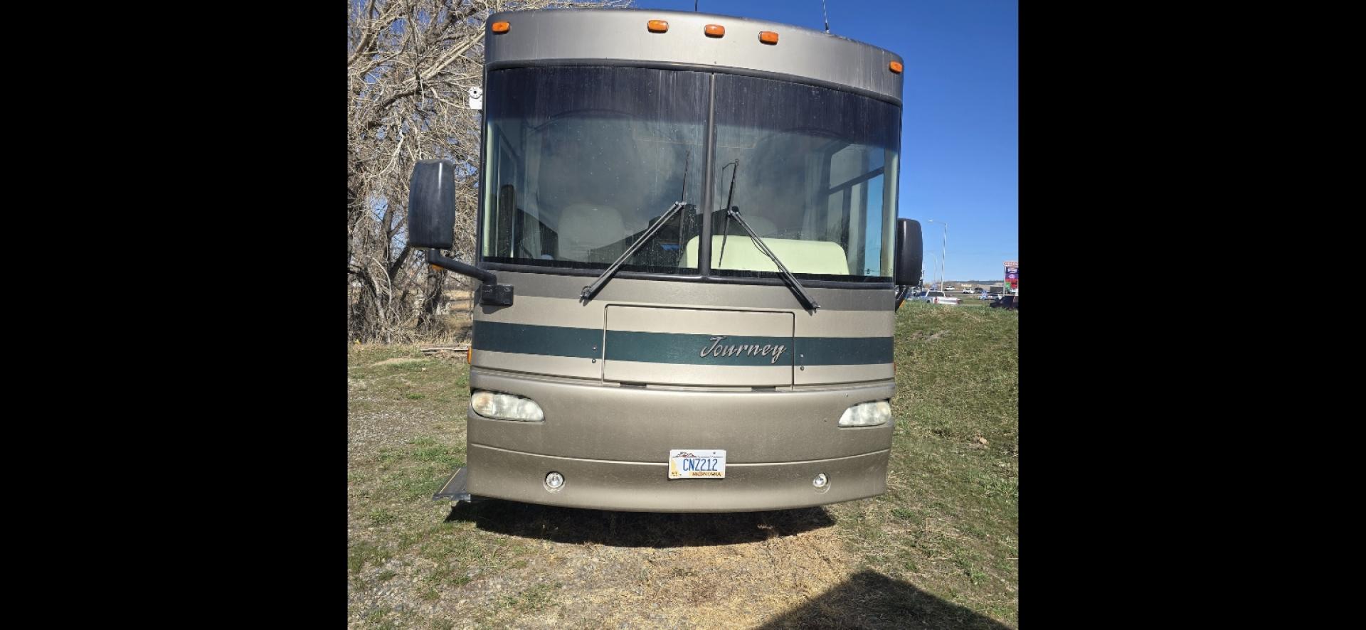 2004 Brown Winnebago Journey , located at 923 US HWY 87 E., Billings, MT, 59101, (406) 245-0456, 45.795788, -108.451881 - 2004 Winnebago Journey 34H Located in Billings MT $41,900 READY TO GO!!!! Nice 34' class A motor home with two slides, model 34H, 330 hsp cat diesel pusher, freightliner chassis, full body paint, 50,461 miles, wired for towing, backup camera, leveling jacks, four season, tires like new. WE C - Photo#2