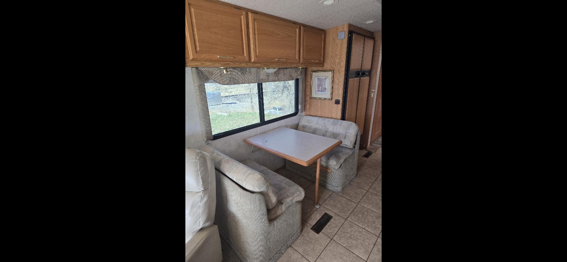 2004 Brown Winnebago Journey , located at 923 US HWY 87 E., Billings, MT, 59101, (406) 245-0456, 45.795788, -108.451881 - 2004 Winnebago Journey 34H Located in Billings MT $41,900 READY TO GO!!!! Nice 34' class A motor home with two slides, model 34H, 330 hsp cat diesel pusher, freightliner chassis, full body paint, 50,461 miles, wired for towing, backup camera, leveling jacks, four season, tires like new. WE C - Photo#11