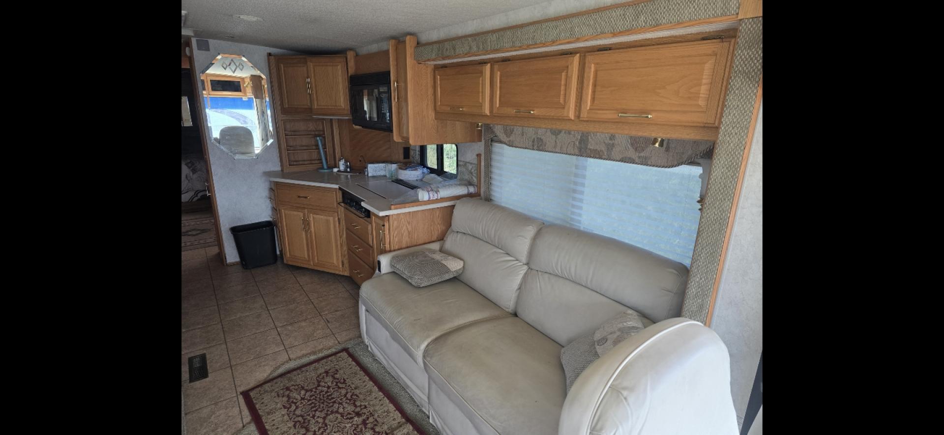 2004 Brown Winnebago Journey , located at 923 US HWY 87 E., Billings, MT, 59101, (406) 245-0456, 45.795788, -108.451881 - 2004 Winnebago Journey 34H Located in Billings MT $41,900 READY TO GO!!!! Nice 34' class A motor home with two slides, model 34H, 330 hsp cat diesel pusher, freightliner chassis, full body paint, 50,461 miles, wired for towing, backup camera, leveling jacks, four season, tires like new. WE C - Photo#10
