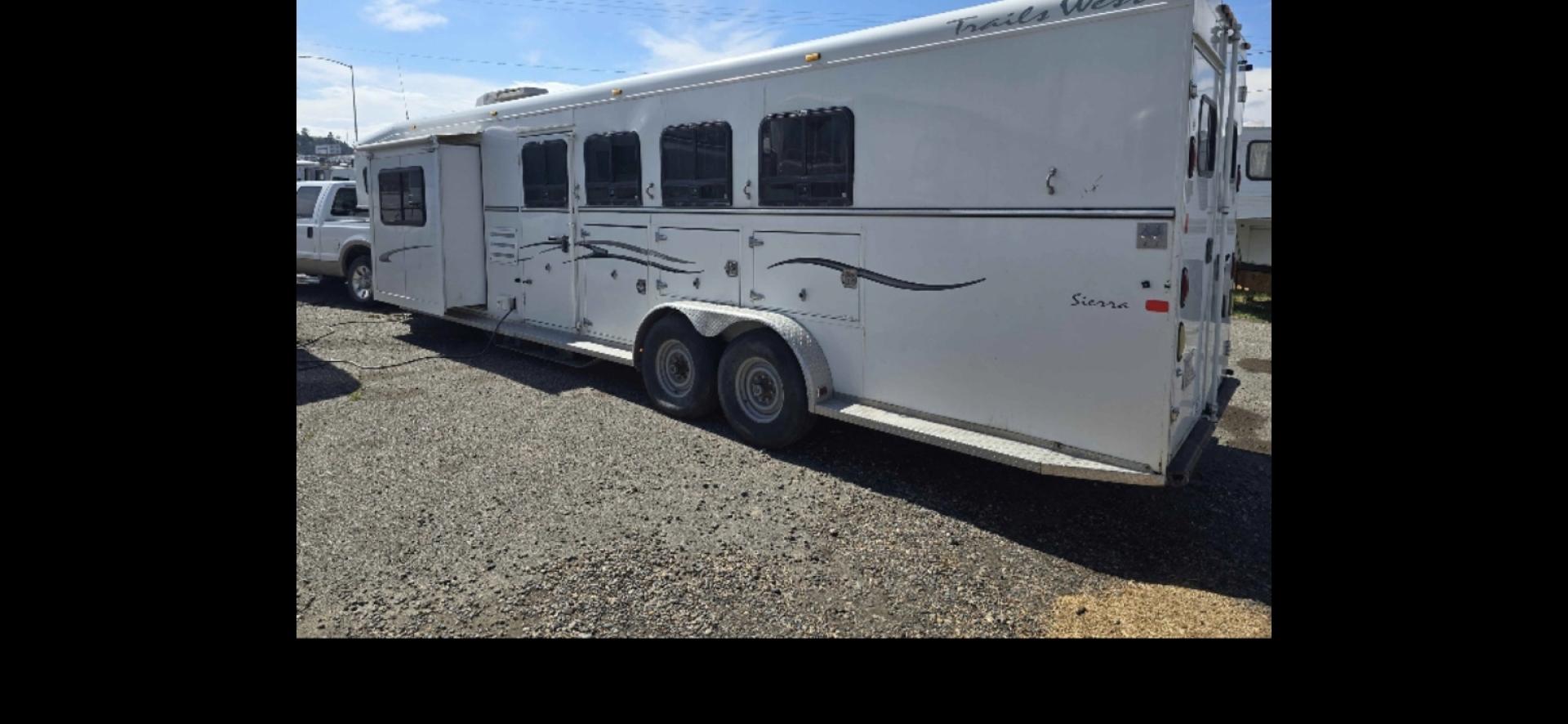 2005 White Merhow 4 Horse w/Slide , located at 923 US HWY 87 E., Billings, MT, 59101, (406) 245-0456, 45.795788, -108.451881 - 2005 Trails West Sierra 9140SO 4 Horse LQ 2005 Trails West 4 Horse w/slide Located in Billings MT $27,500 Nice Clean Trailer-Model 9140SO 4 horse with a full auto slide and electric front jack, 7' wide, w/mangers, 11' Shortwall, huge neo angle shower, full bath, shower toilet, a c, hot water - Photo#2