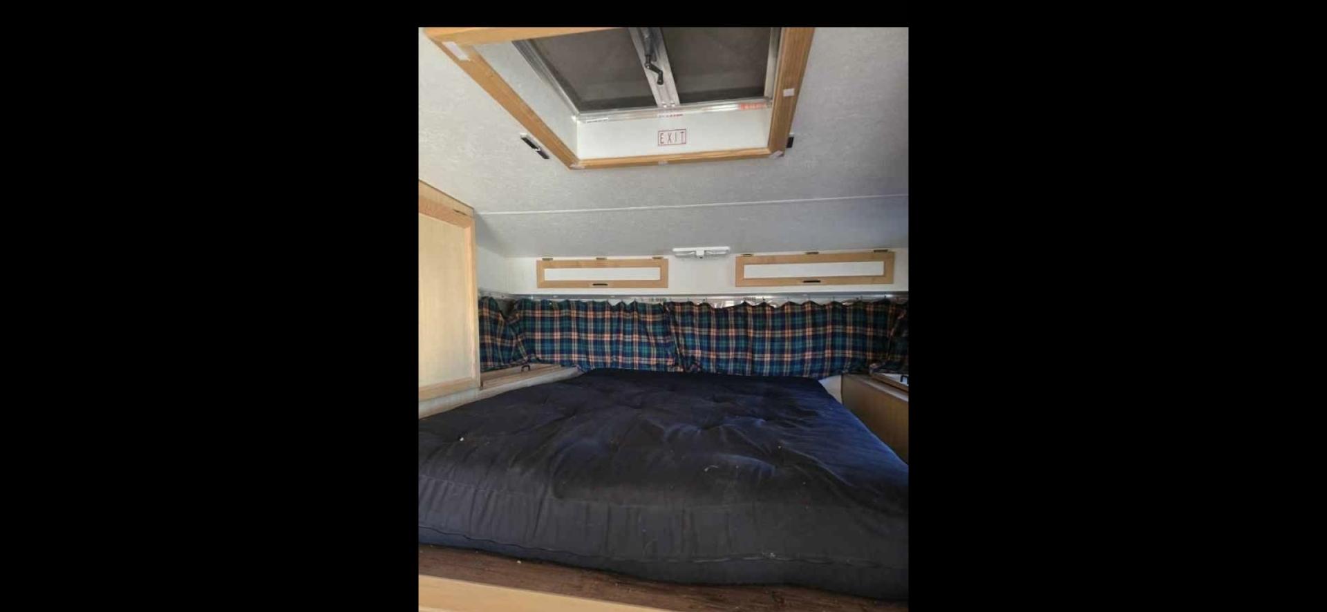 2003 White S&S Bitterroot 85C , located at 923 US HWY 87 E., Billings, MT, 59101, (406) 245-0456, 45.795788, -108.451881 - 2003 S&S Bitterroot 85C 8' Slide In 8' Slide In trailer with full bath-shower toilet, 6 gallon hot water heater, forced air heat, manual jacks, comes with full set of turn buckles, upper bunk, front queen bed, booth folds into bed. Full fridge/freezer that is 12V or propane. Dry weight 2500 LBS - Photo#3