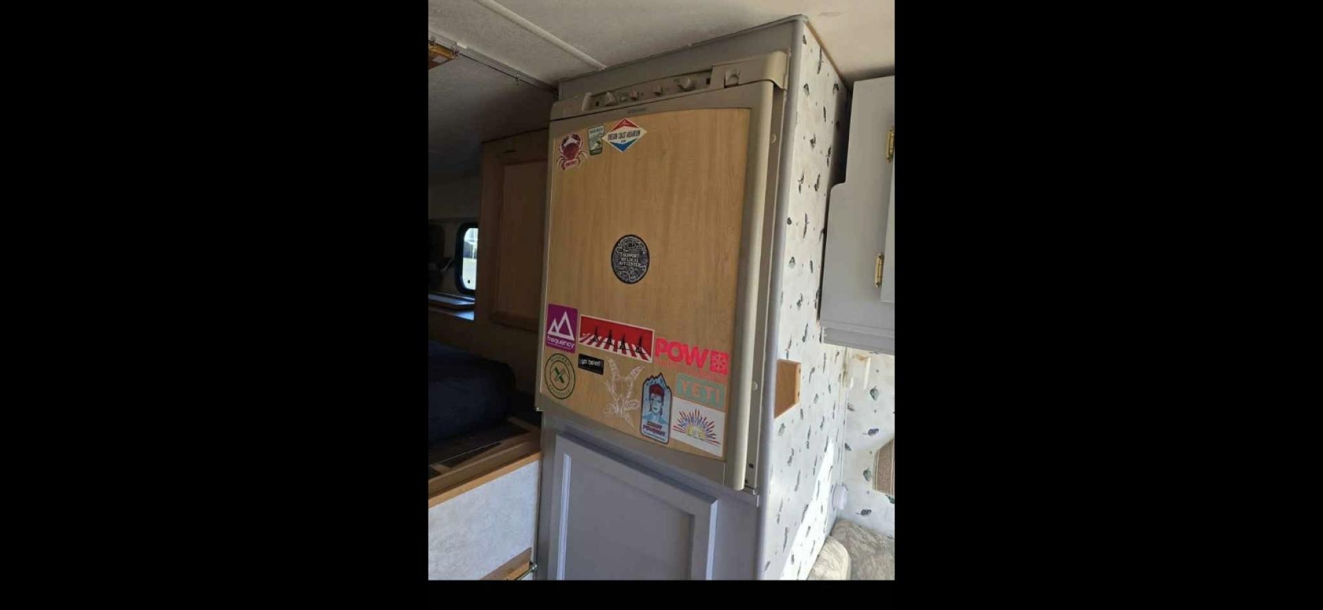 2003 White S&S Bitterroot 85C , located at 923 US HWY 87 E., Billings, MT, 59101, (406) 245-0456, 45.795788, -108.451881 - 2003 S&S Bitterroot 85C 8' Slide In 8' Slide In trailer with full bath-shower toilet, 6 gallon hot water heater, forced air heat, manual jacks, comes with full set of turn buckles, upper bunk, front queen bed, booth folds into bed. Full fridge/freezer that is 12V or propane. Dry weight 2500 LBS - Photo#5