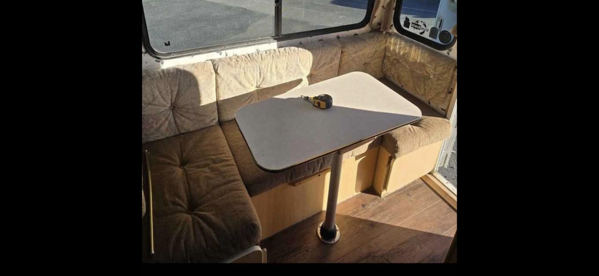 2003 White S&S Bitterroot 85C , located at 923 US HWY 87 E., Billings, MT, 59101, (406) 245-0456, 45.795788, -108.451881 - 2003 S&S Bitterroot 85C 8' Slide In 8' Slide In trailer with full bath-shower toilet, 6 gallon hot water heater, forced air heat, manual jacks, comes with full set of turn buckles, upper bunk, front queen bed, booth folds into bed. Full fridge/freezer that is 12V or propane. Dry weight 2500 LBS - Photo#6