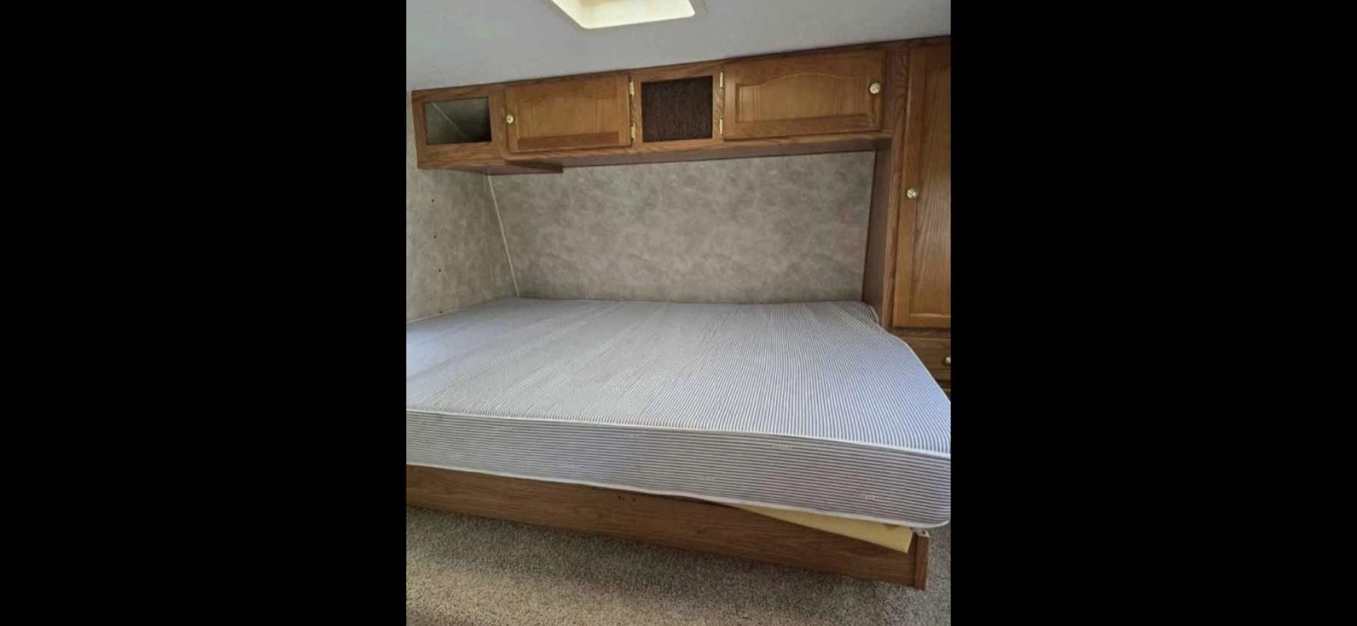 2006 White Keystone Springdale , located at 923 US HWY 87 E., Billings, MT, 59101, (406) 245-0456, 45.795788, -108.451881 - 2006 Keystone Springdale Adventure RV in Billings MT $7995 Very nice and clean 25' Springdale with a large super slide, front queen walk around bed, rear bunks that are 29" wide and 6'4" long, full awning, rear hitch, a/c, hot water, furnace. Booth dinette makes into a bed. Could sleep 6. Model - Photo#8