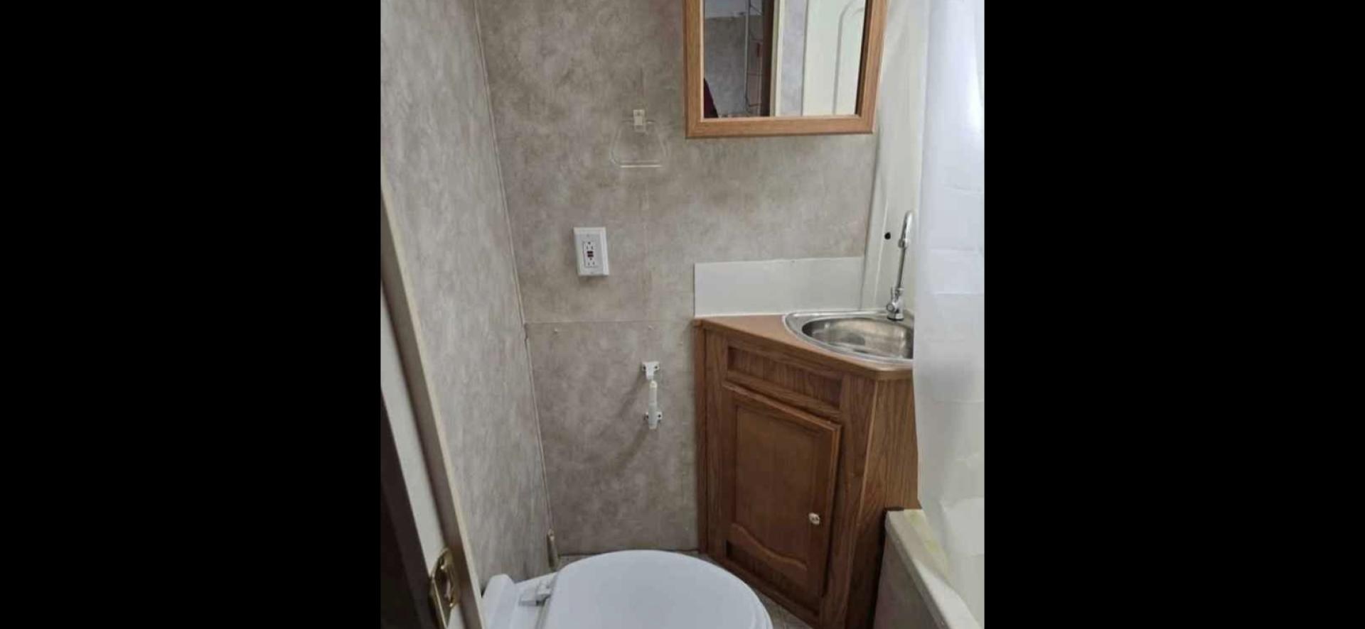 2006 White Keystone Springdale , located at 923 US HWY 87 E., Billings, MT, 59101, (406) 245-0456, 45.795788, -108.451881 - 2006 Keystone Springdale Adventure RV in Billings MT $7995 Very nice and clean 25' Springdale with a large super slide, front queen walk around bed, rear bunks that are 29" wide and 6'4" long, full awning, rear hitch, a/c, hot water, furnace. Booth dinette makes into a bed. Could sleep 6. Model - Photo#6