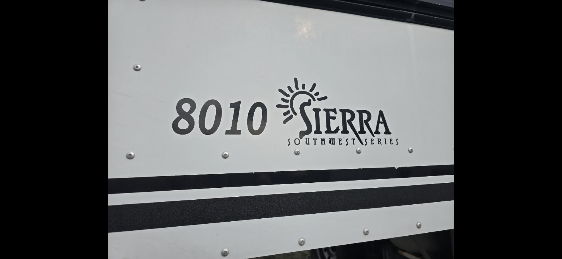 2003 White Sundowner Sierra , located at 923 US HWY 87 E., Billings, MT, 59101, (406) 245-0456, 45.795788, -108.451881 - 2003 Sundowner Sierra 8010 Located in Billings MT $29,900 Absolute beautiful trailer with high end solid oak cabinets, double door fridge.4 horse slant, 8' wide, aluminum on aluminum, hay rack, mangers w/storage, full exterior awning, outside speakers, electric front jack, fold down windows in - Photo#3