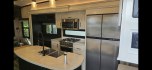 2021 Brown Jayco Pinnacle , located at 923 US HWY 87 E., Billings, MT, 59101, (406) 245-0456, 45.795788, -108.451881 - 2021 Jayco Pinnacle 32RLTS Located in Billings MT $49,900 WOW HOME AWAY FROM HOME-- 3 slides, 32', king size bed platform, full body paint. Heated and enclosed under belly, dual A/C's, auto seek satellite dish, onan 5500LP generator, washer dryer hookups, central vac, solid surface counter to- Photo#5