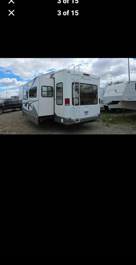 2007 White Western Alpen Lite , located at 923 US HWY 87 E., Billings, MT, 59101, (406) 245-0456, 45.795788, -108.451881 - 2007 Western Rv Alpenlite PERFECT TRAILER FOR A COUPLE!!! 3 slides solid surface countertops, spacious kitchen area, glass enclosed, shower, cold weather package, solar package, slide out cart in underbelly. Front queen bed and couch makes into bed. Could sleep 4. WE CERTIFY OUR USED TRAILERS!!!J- Photo#2