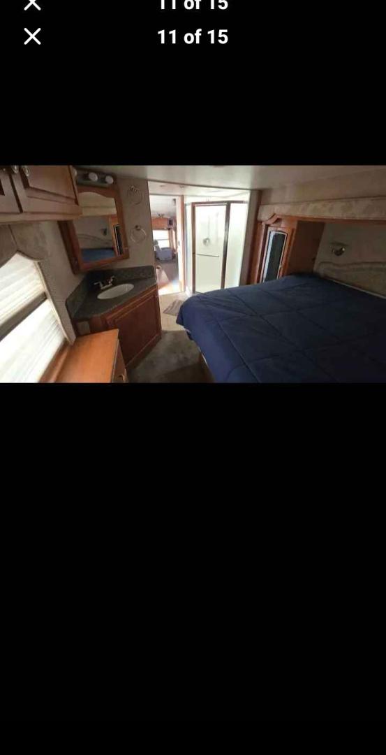 2007 White Western Alpen Lite , located at 923 US HWY 87 E., Billings, MT, 59101, (406) 245-0456, 45.795788, -108.451881 - 2007 Western Rv Alpenlite PERFECT TRAILER FOR A COUPLE!!! 3 slides solid surface countertops, spacious kitchen area, glass enclosed, shower, cold weather package, solar package, slide out cart in underbelly. Front queen bed and couch makes into bed. Could sleep 4. WE CERTIFY OUR USED TRAILERS!!!J- Photo#10